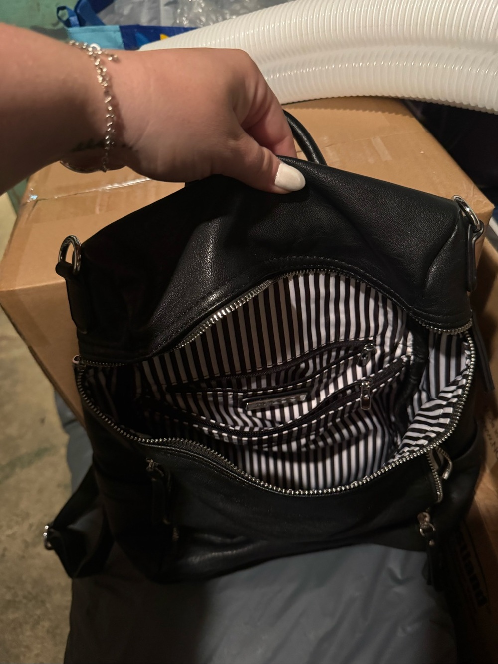 Black Leather-Look Backpack with Striped Lining